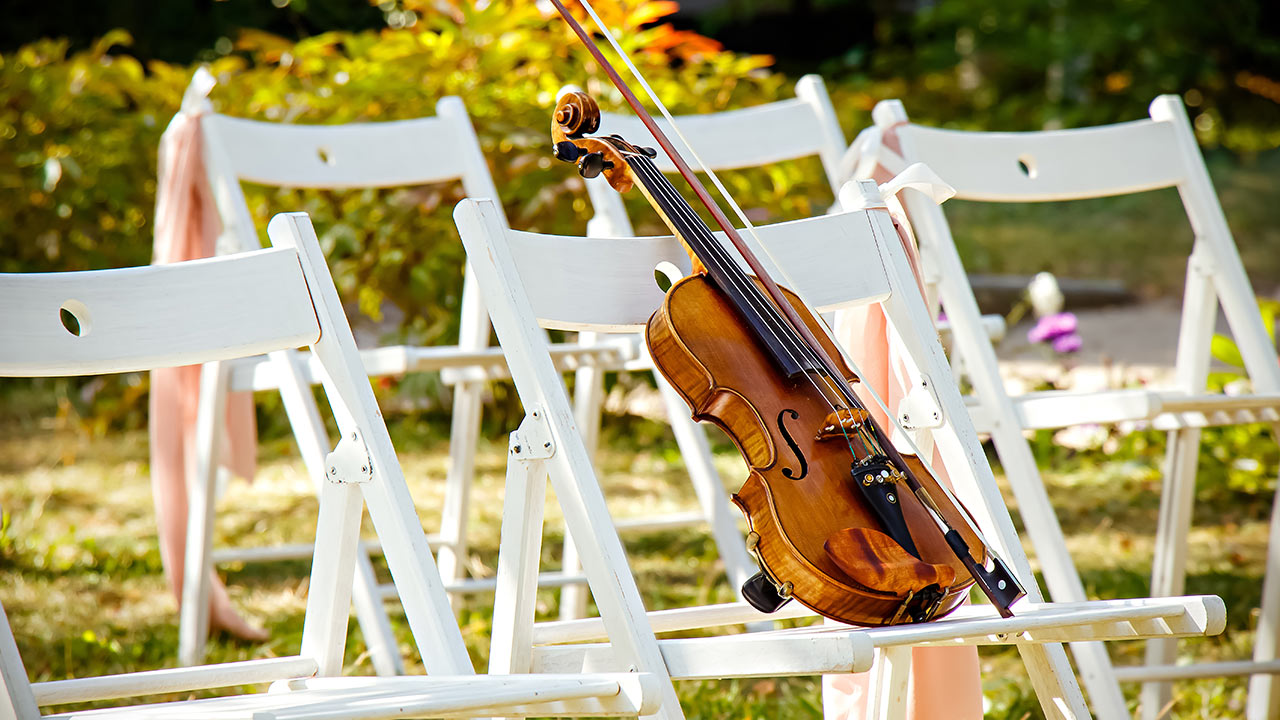 A violin at a wedding, ready to play