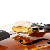 Comosono Silence Hotel Mute for violin and viola, clamped on bridge, fingerboard side view